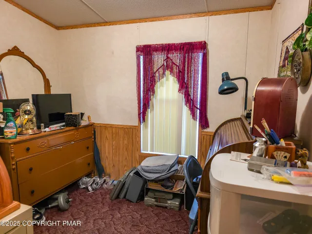 a bathroom with a sink mirror and toilet