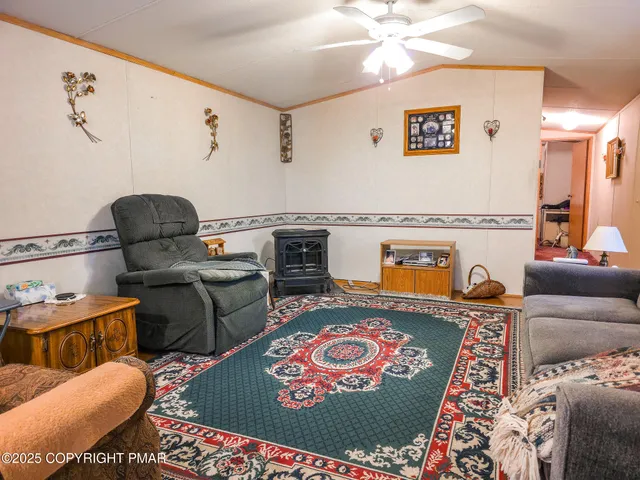 a living room with furniture and rug