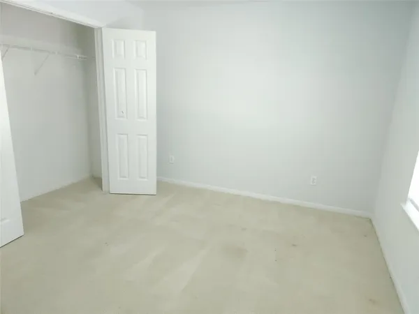 an empty room with an entryway