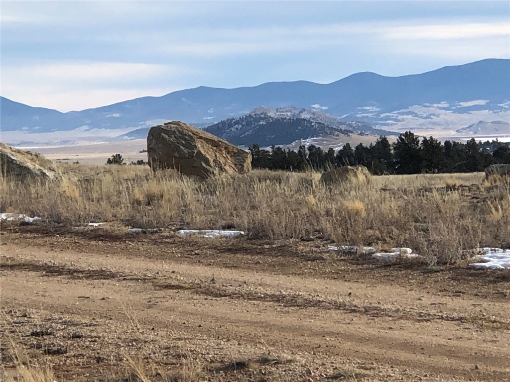 1397 Yellowstone Road Hartsel, CO 80449 - Photo 2 of 13 a view of a town with mountains in the background
