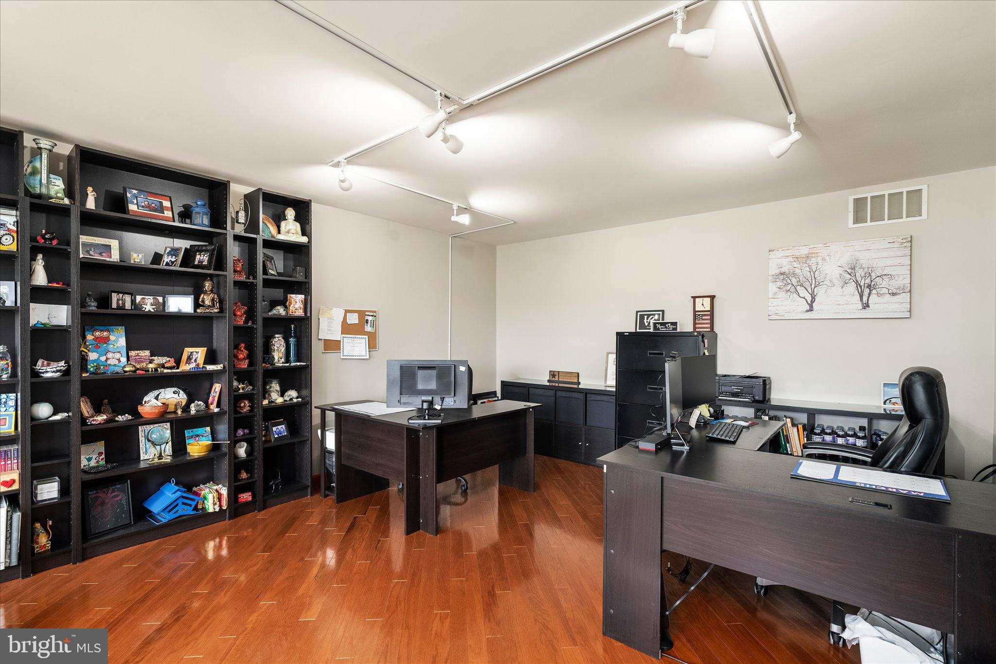 282 Chesterfield Jacobstown Road Wrightstown, NJ 08562 - Photo 12 of 70 a view of a workspace with furniture and wooden floor