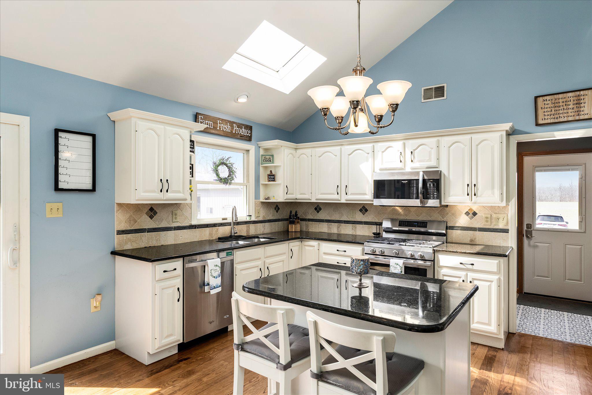 282 Chesterfield Jacobstown Road Wrightstown, NJ 08562 - Photo 18 of 70 a kitchen with stainless steel appliances granite countertop a sink a stove and a refrigerator