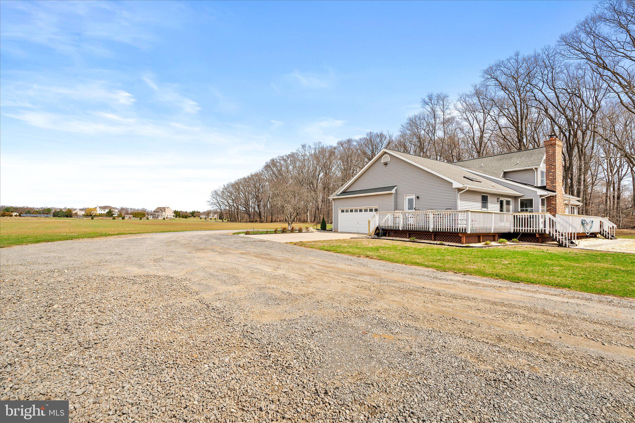 282 Chesterfield Jacobstown Road Wrightstown, NJ 08562 - Photo 44 of 70 a view of a house with a big yard and large trees