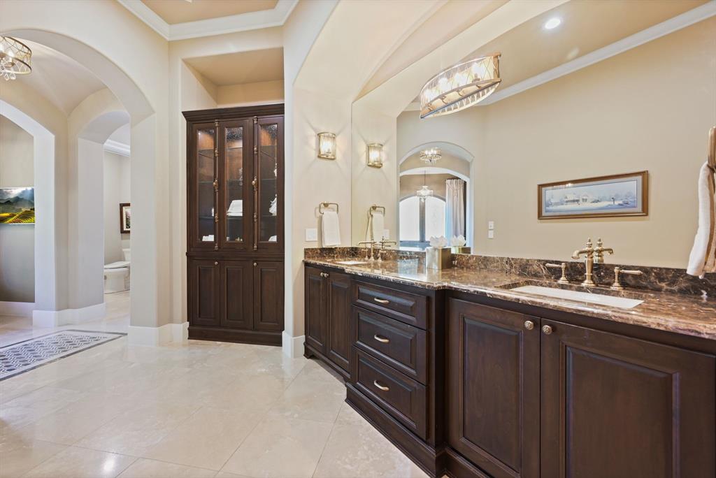 325 River Ridge Spring Branch, TX 78070 - Photo 24 of 40 a bathroom with a granite countertop double vanity sink and a mirror