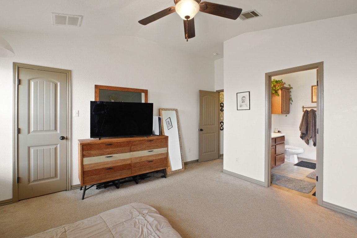 11012 Short Springs Drive Austin, TX 78754 - Photo 14 of 28 a view of room with furniture and flat screen tv