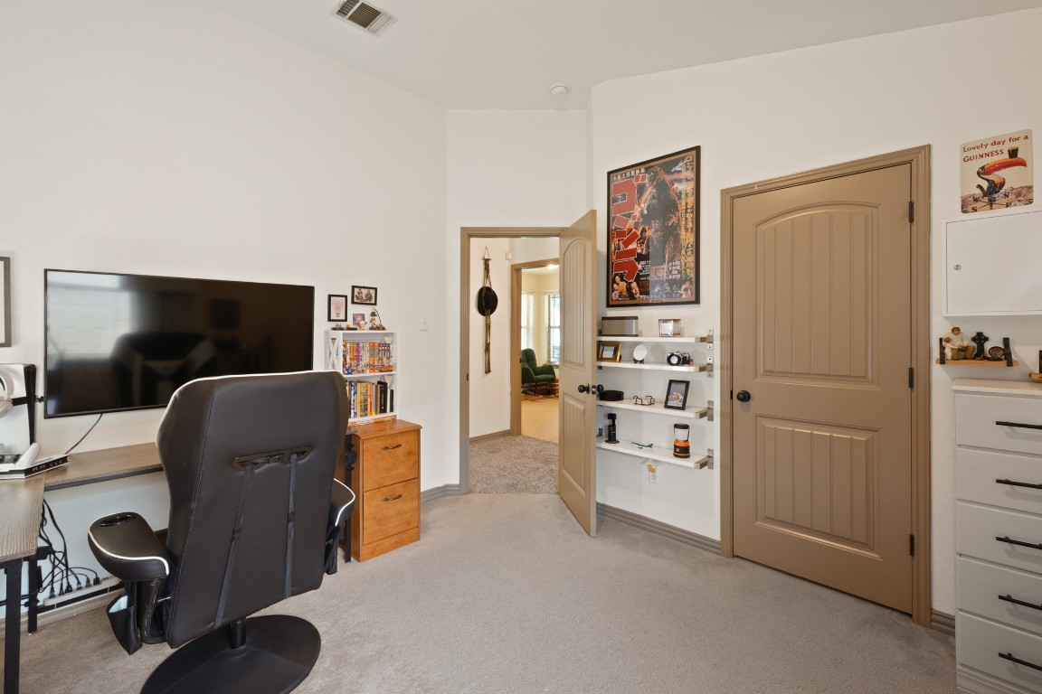 11012 Short Springs Drive Austin, TX 78754 - Photo 21 of 28 a view of a livingroom with workspace and a couch