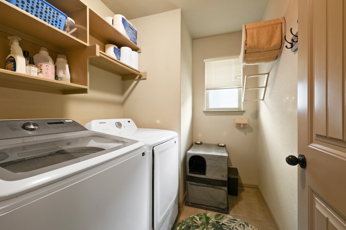 11012 Short Springs Drive Austin, TX 78754 - Photo 23 of 28 a utility room with dryer and washer