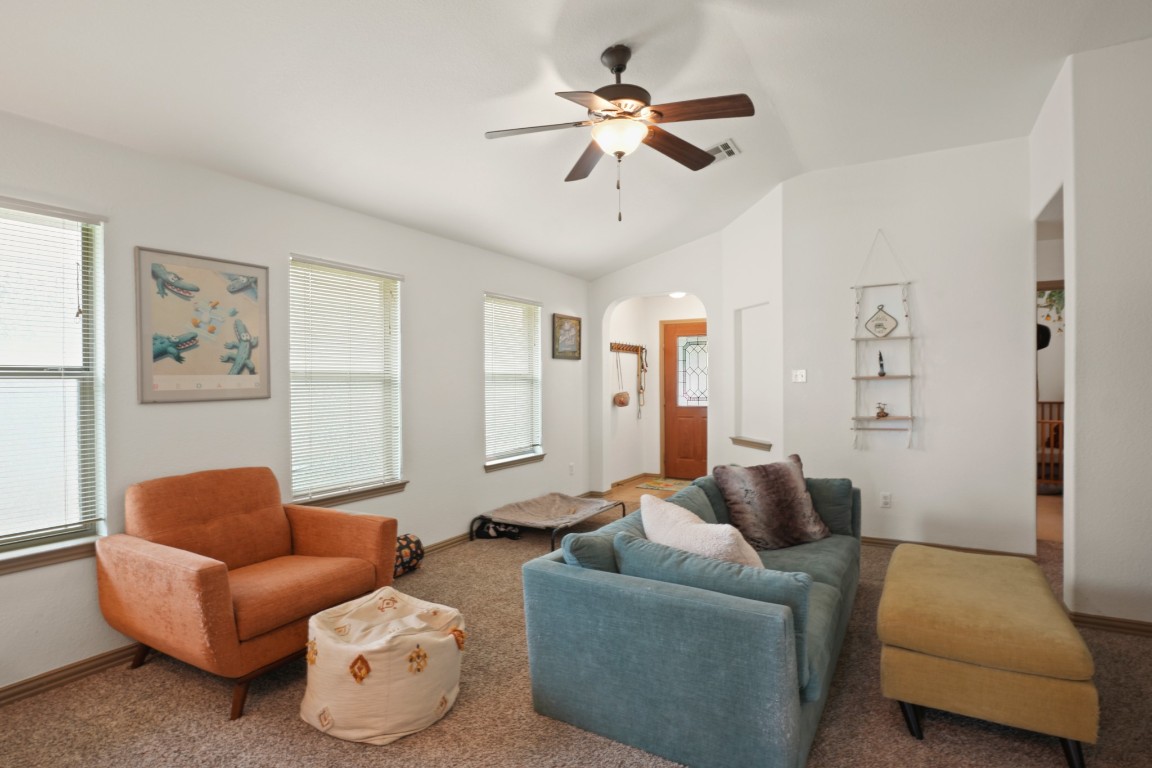 11012 Short Springs Drive Austin, TX 78754 - Photo 5 of 28 a living room with furniture and a large window