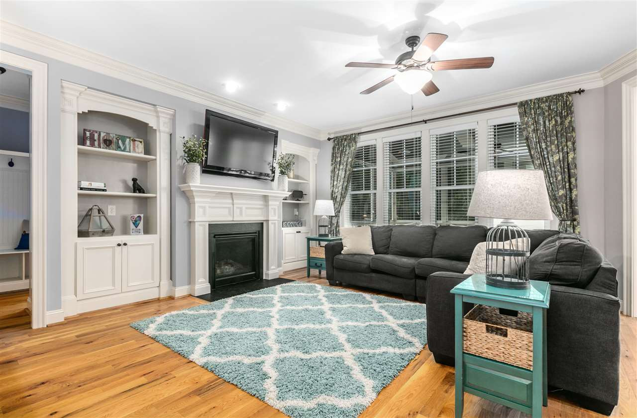 421 Redhill Road Holly Springs, NC 27540 - Photo 8 of 30 Spacious family room with build-ins, gas fireplace perfect for move nights! Family Room