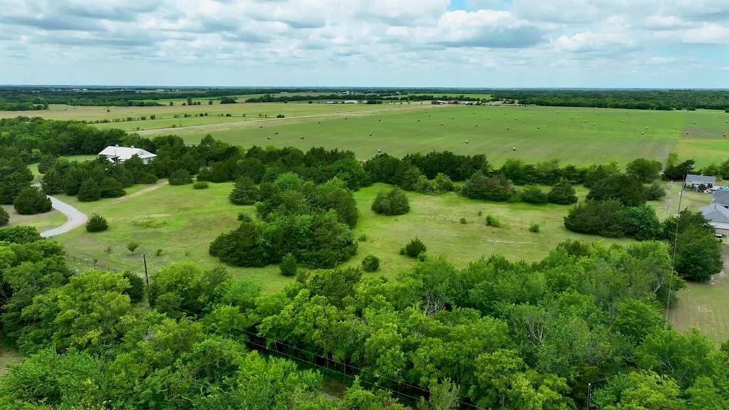 59.69-acres Bucksnort Road Van Alstyne, TX 75495 - Photo 5 of 5 a view of a lake with a city