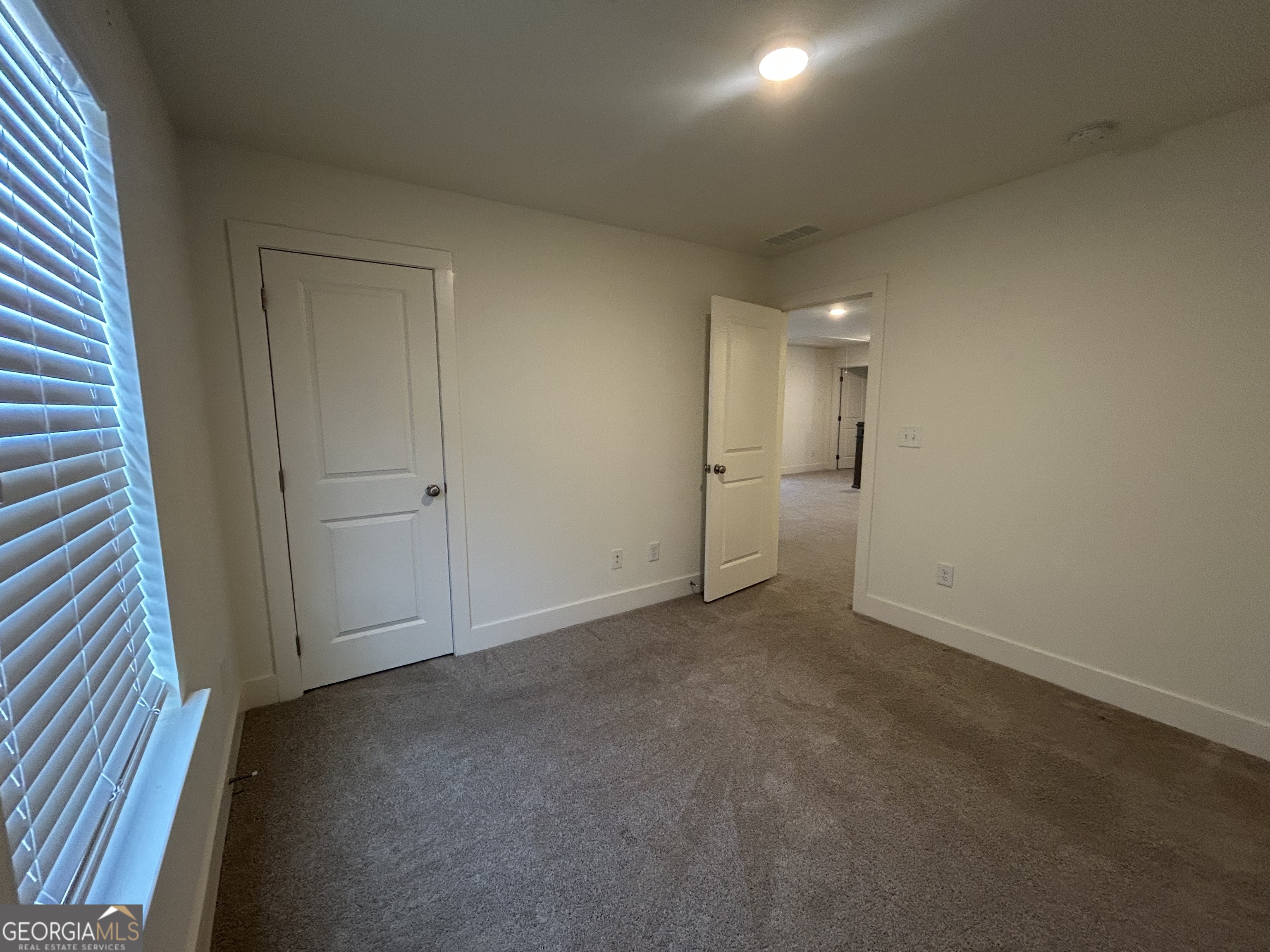 7741 Squire Court Fairburn, GA 30213 - Photo 15 of 25 a view of empty room