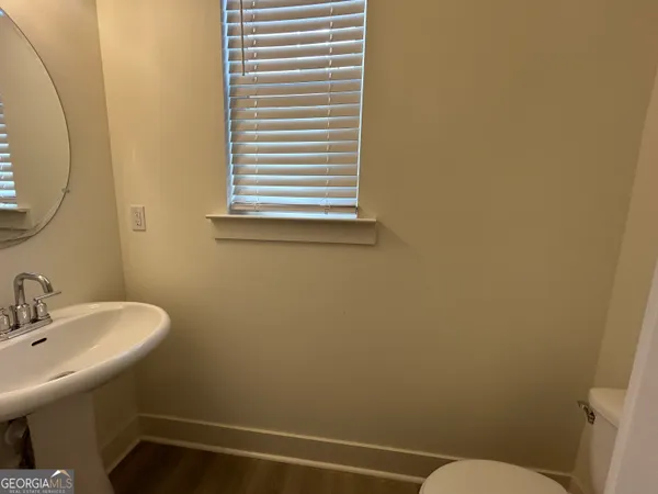 a bathroom with a sink and a toilet