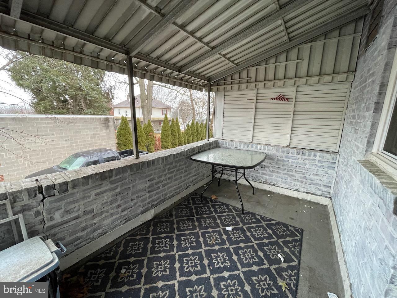 917 Darby Road Havertown, PA 19083 - Photo 12 of 16 Charming covered patio for outdoor relaxation.