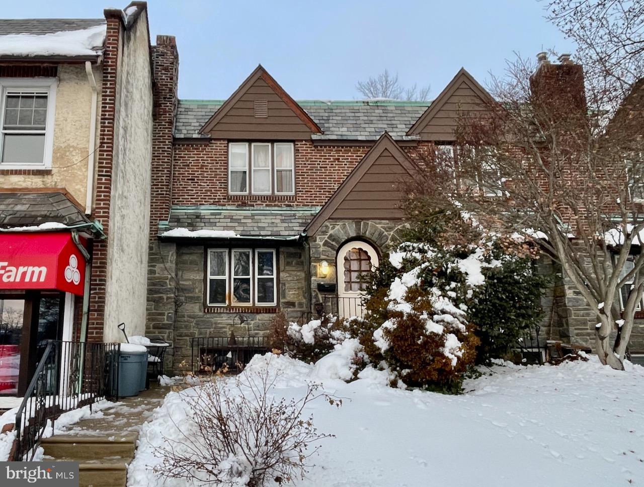 917 Darby Road Havertown, PA 19083 - Photo 2 of 16 Charming brick home blanketed in snow.