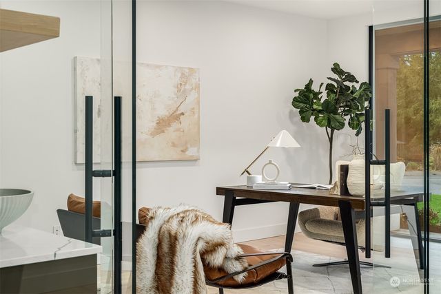 a bedroom with bed and a window