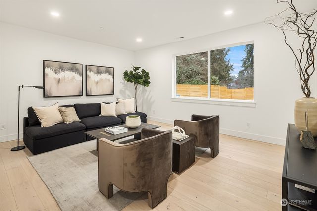 a bathroom with a shower sink and mirror