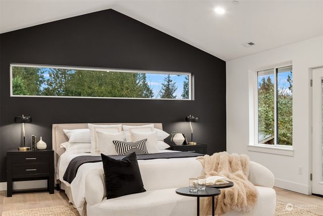 a view of a city with mountains in the background