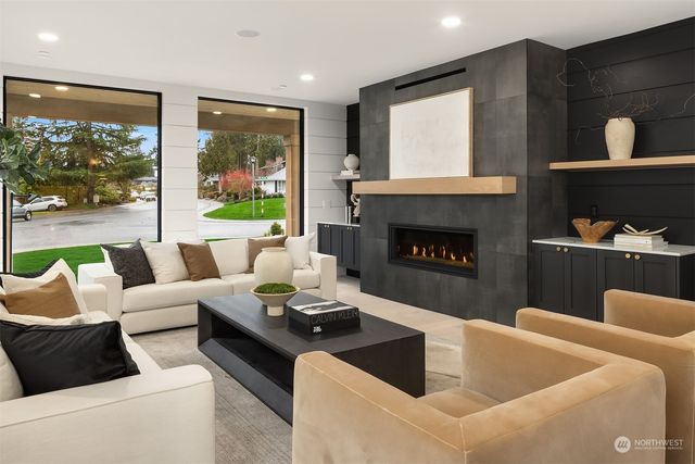 a kitchen with a sink and a stove top oven