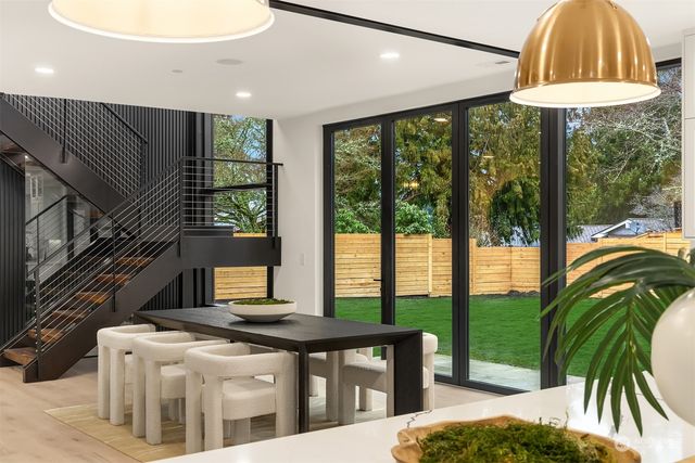 a dining room with wooden floor