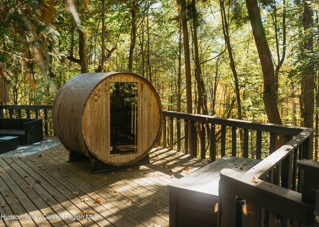 a view of a wooden deck with a trees