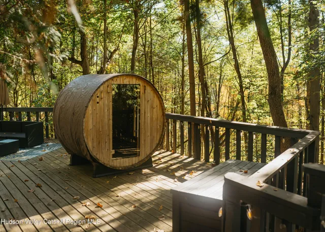 a view of a wooden deck with a trees