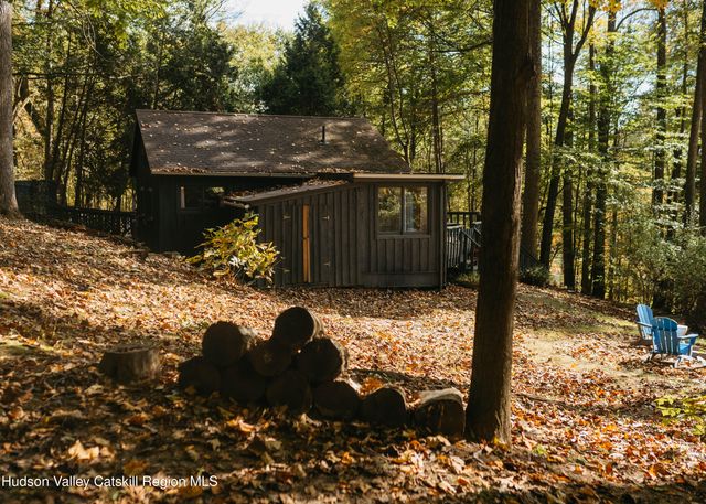 a view of a backyard of the house