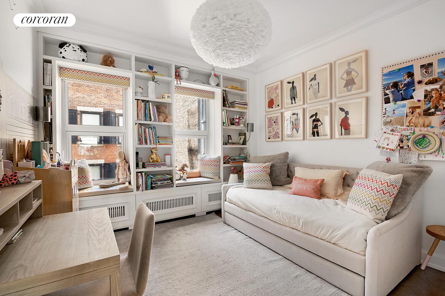 16 West 21st Street, Unit 10/11 Manhattan, NY 10010 - Photo 14 of 18 a living room with furniture and large window