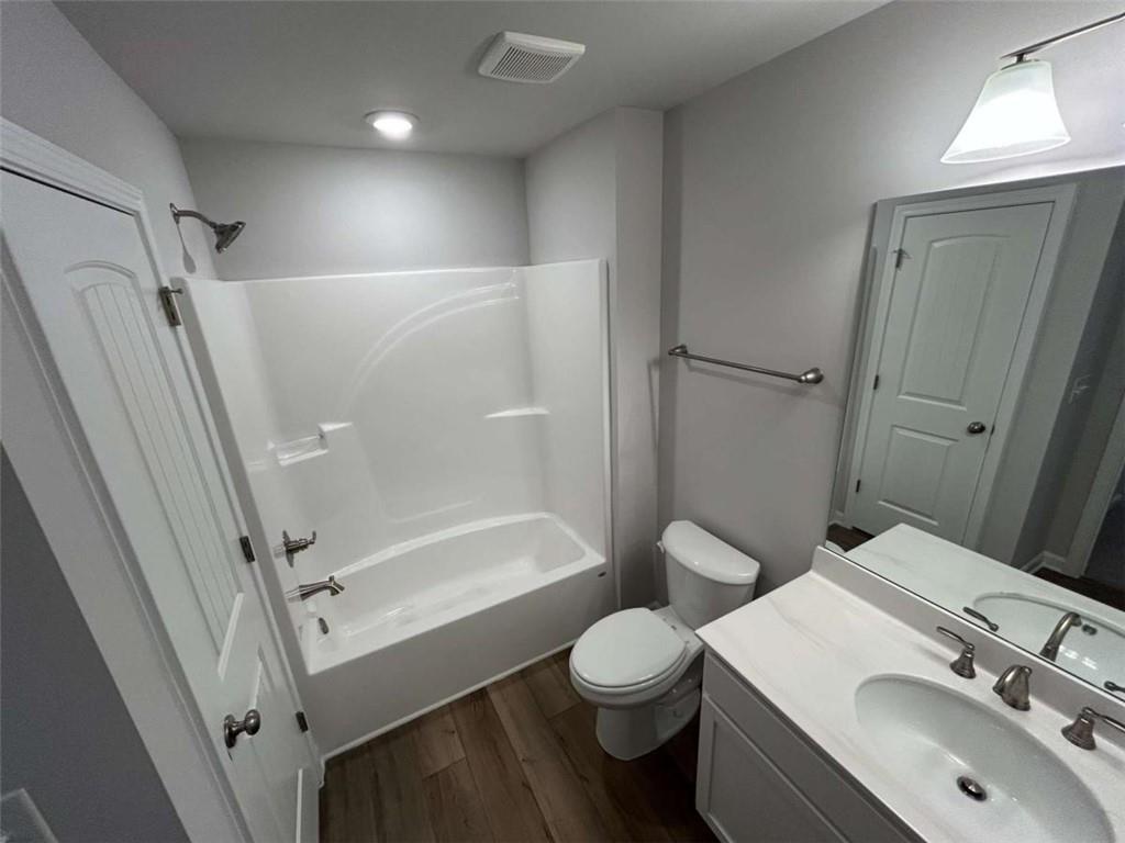 4 Stonebrook Drive Rome, GA 30165 - Photo 18 of 19 a bathroom with a sink toilet and shower