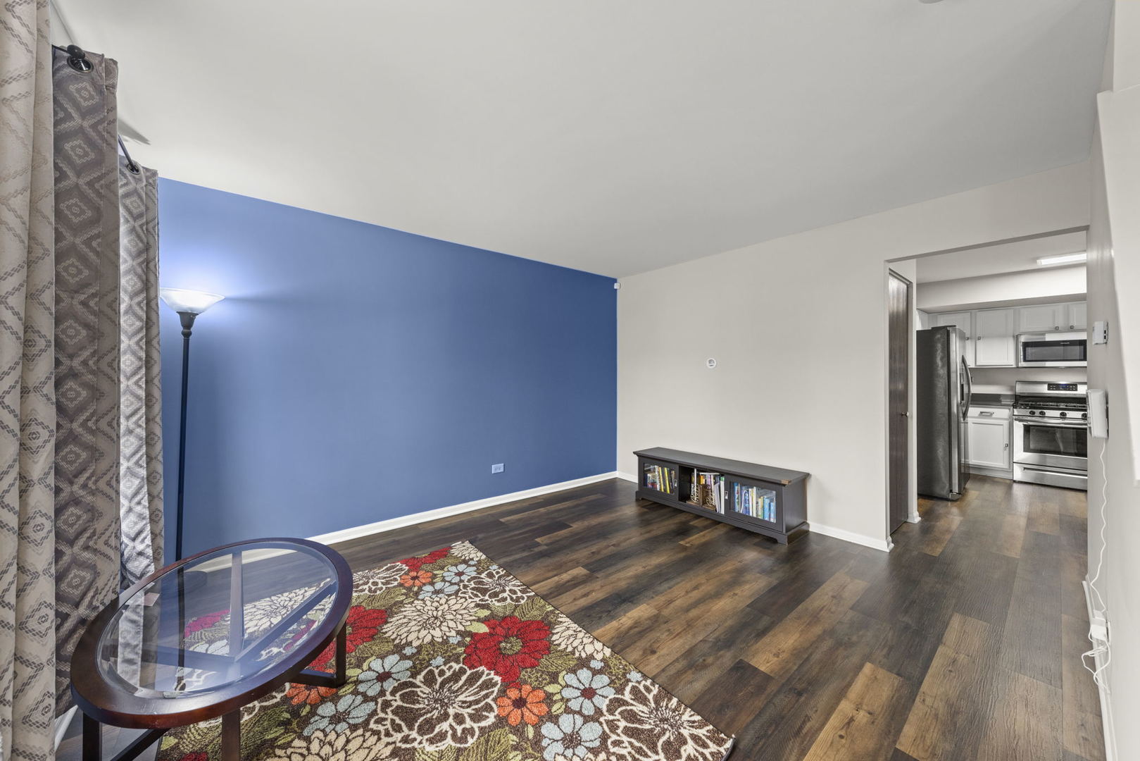 31 Harmony Lane Romeoville, IL 60446 - Photo 14 of 27 a view of a livingroom with furniture and wooden floor