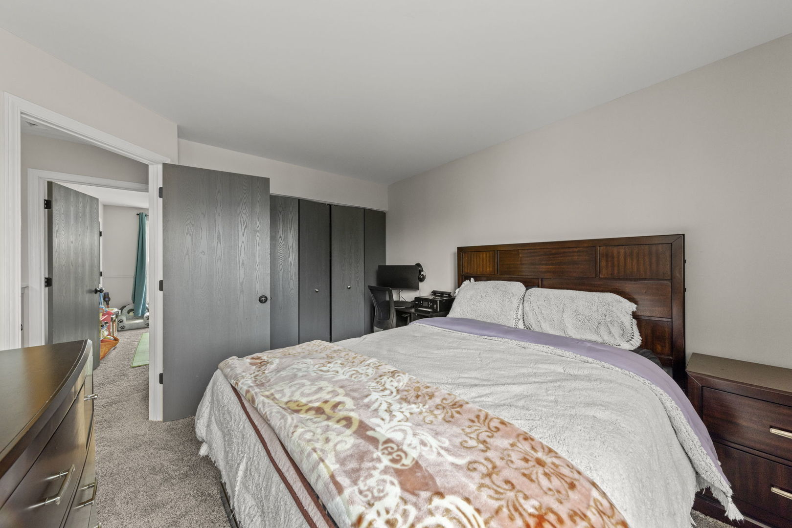 31 Harmony Lane Romeoville, IL 60446 - Photo 15 of 27 a bedroom with a bed and wooden floor