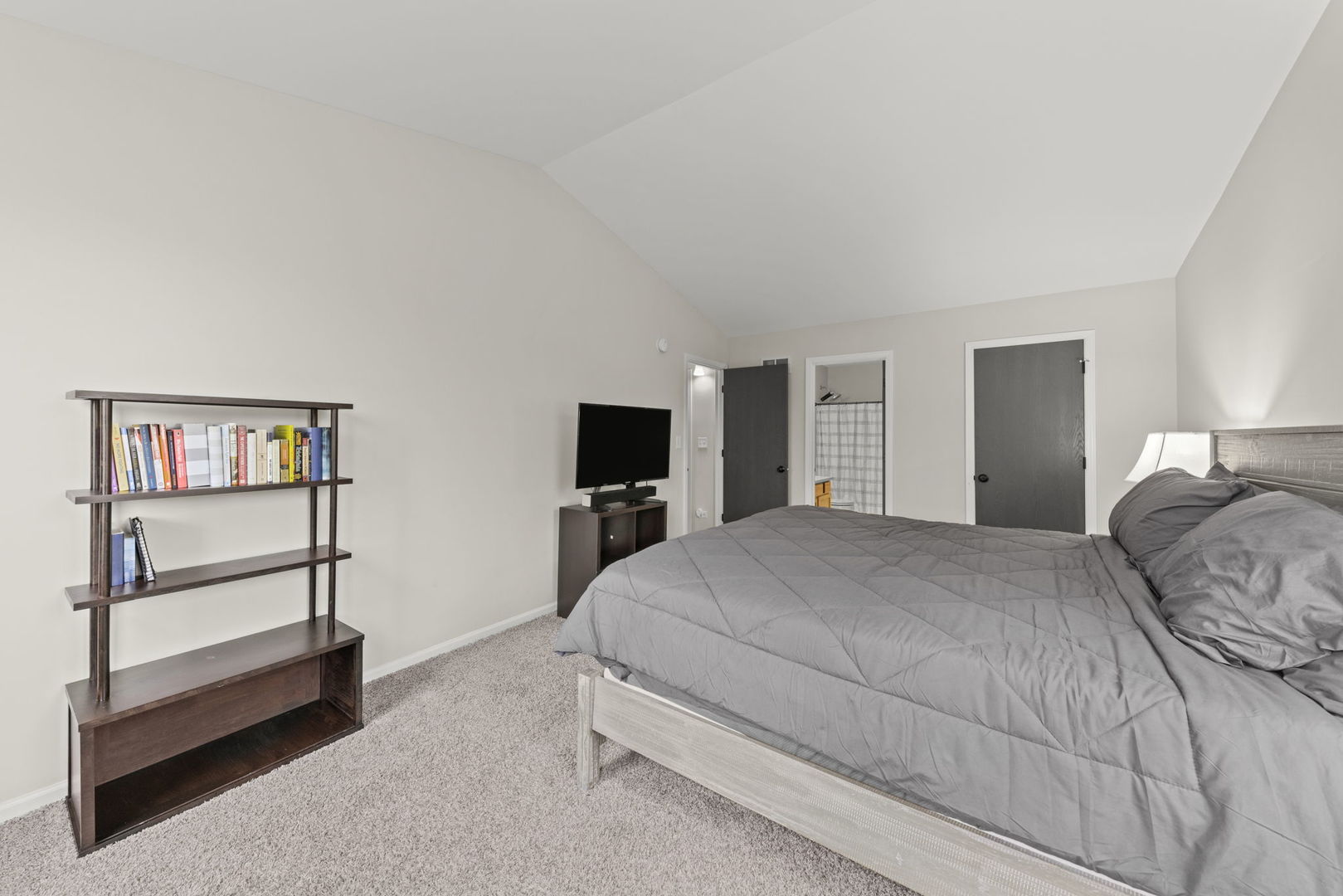 31 Harmony Lane Romeoville, IL 60446 - Photo 18 of 27 a bedroom with a bed and a flat screen tv