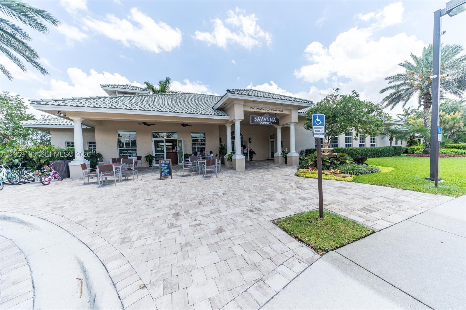 1653 Zenith Way Weston, FL 33327 - Photo 19 of 22 a view of a house with a patio