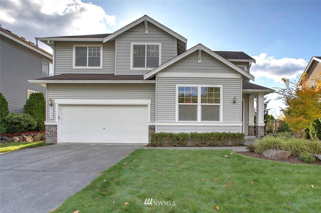 27555 Maple Ridge Way Southeast Maple Valley, WA 98038 - Photo 1 of 25 a view of front a house with a yard