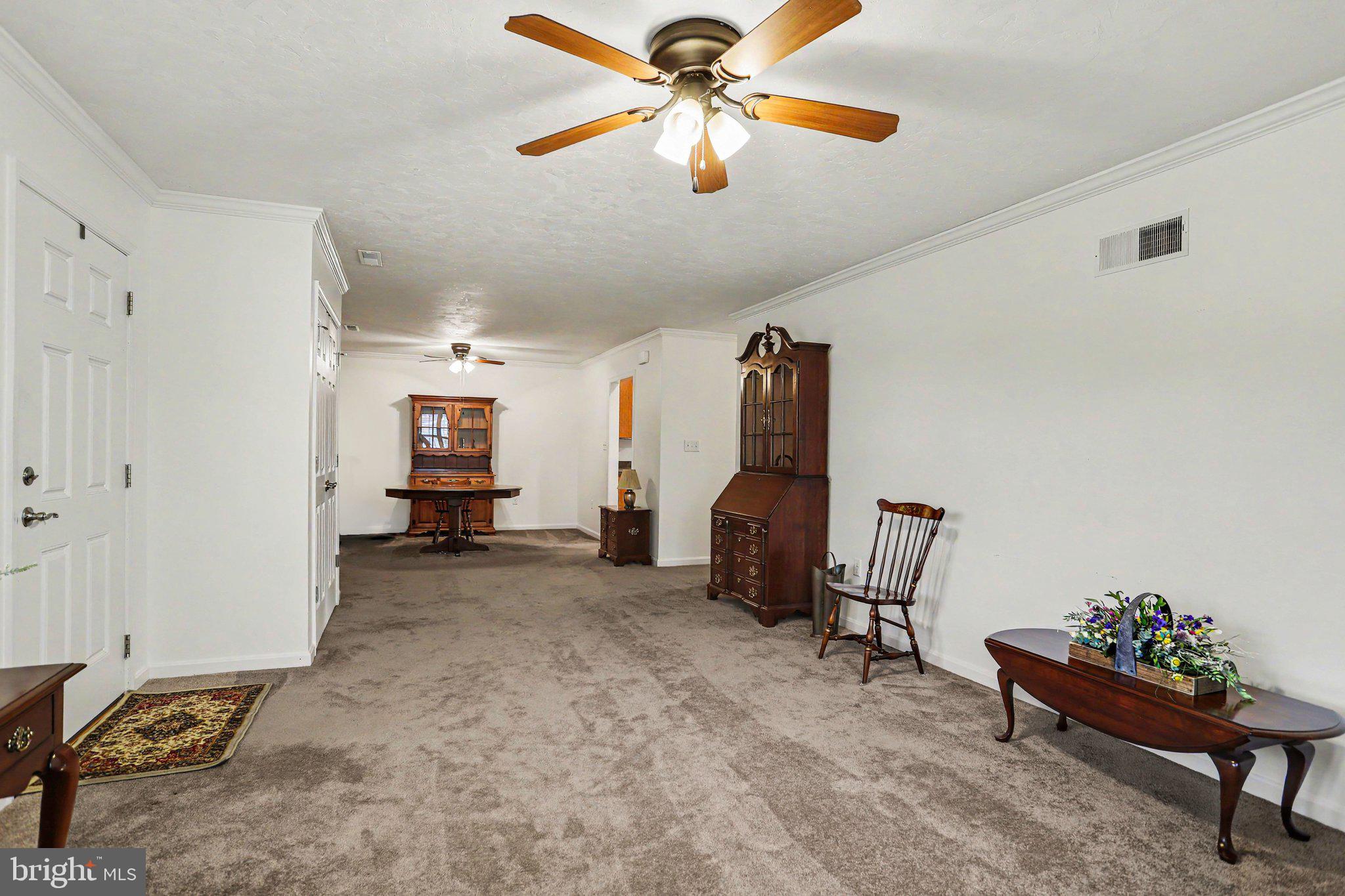 1371 Chami Drive, Unit 166 Spring Grove, PA 17362 - Photo 7 of 28 a view of a livingroom with workspace and a window