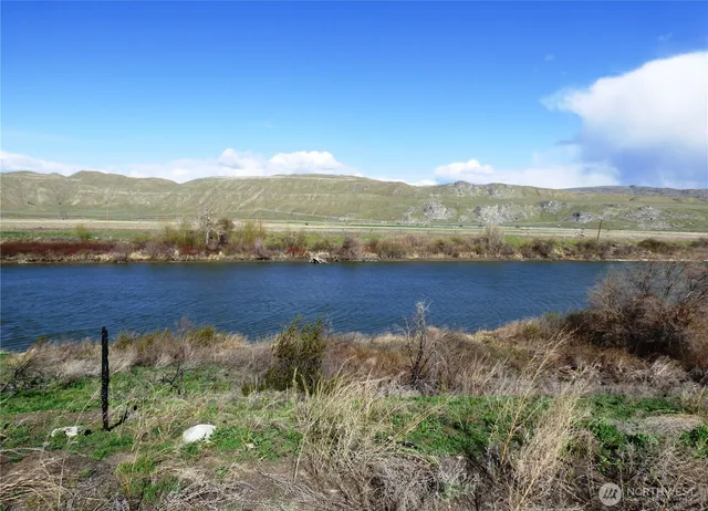 a view of a lake with mountains in the background