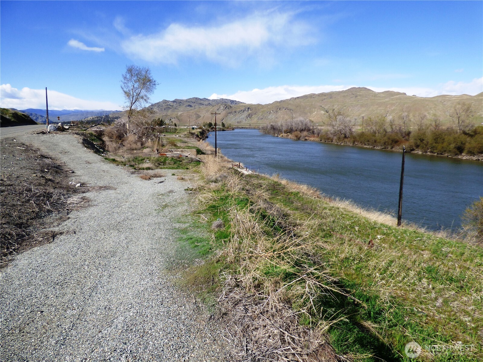 608 Monse River Road Brewster, WA 98812 - Photo 4 of 7 a view of a yard with mountain view