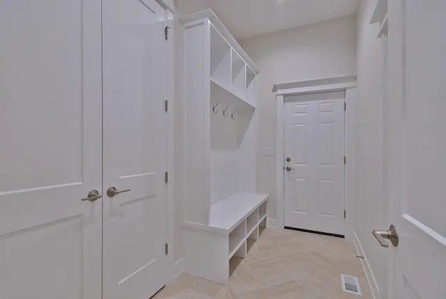 a bathroom with a tub and shower