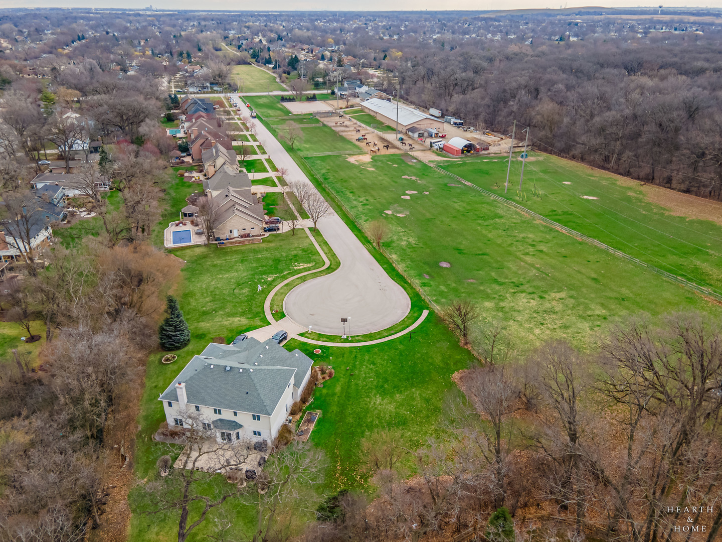 282 Amherst Meadow Bartlett, IL 60103 - Photo 4 of 6 an aerial view of residential houses with outdoor space and trees