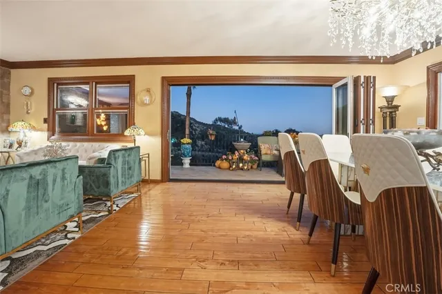 a view of a dining room with furniture window and outside view