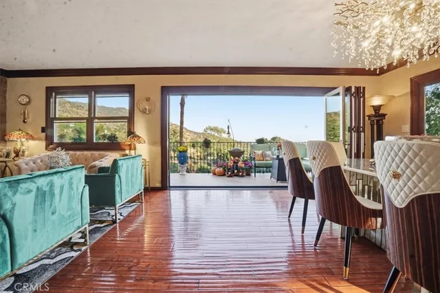 a view of a swimming pool with a patio and a garden