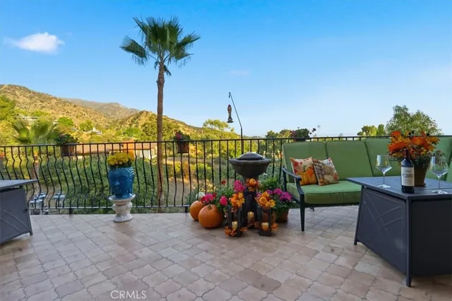 a kitchen with stainless steel appliances a refrigerator sink and cabinets
