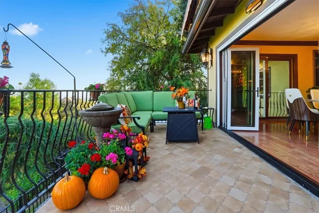 a kitchen with stainless steel appliances granite countertop a sink and a stove