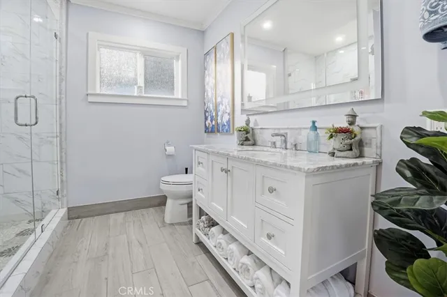 a outdoor space with patio the couch and a potted plant