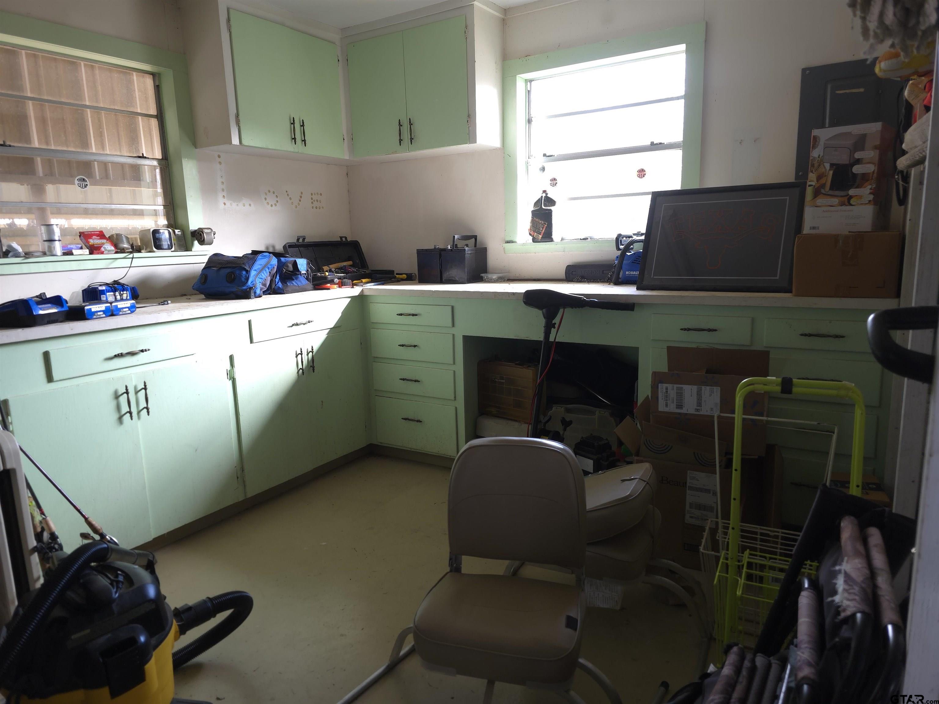109 Randal Lane Pittsburg, TX 75686 - Photo 12 of 22 a kitchen with a sink cabinets and window