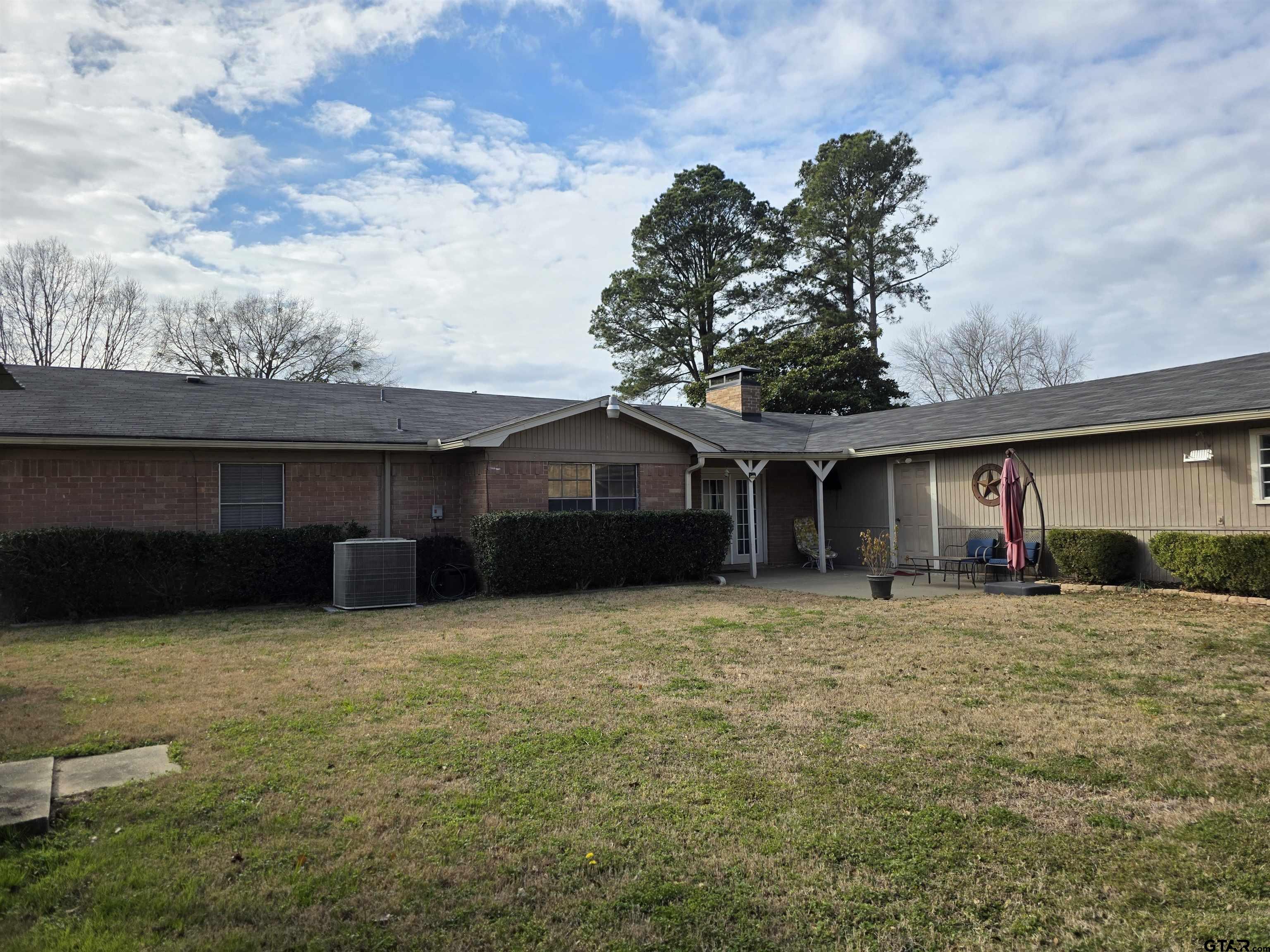 109 Randal Lane Pittsburg, TX 75686 - Photo 20 of 22 a house view with a outdoor space