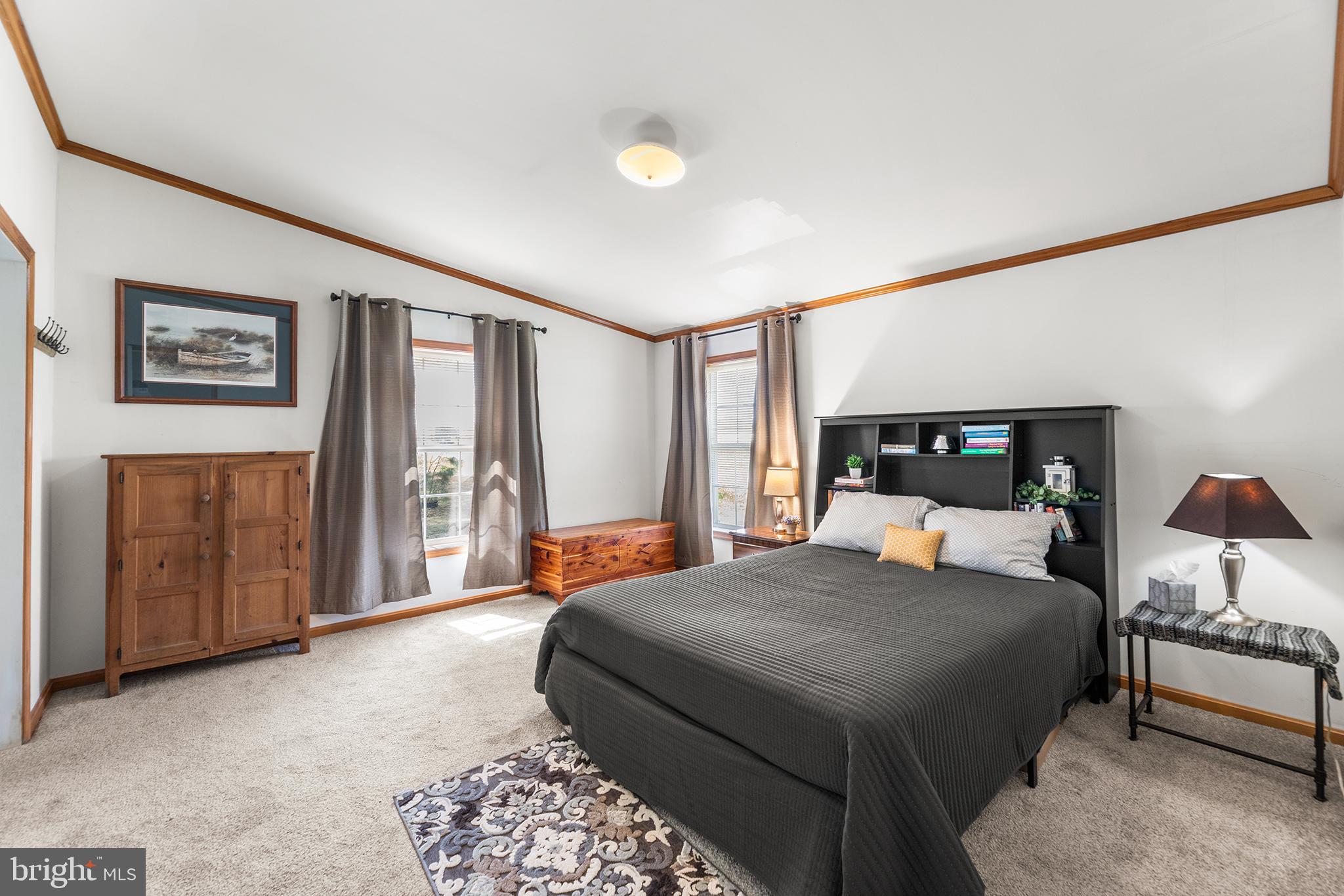 8409 Harmony Road Denton, MD 21629 - Photo 12 of 34 Primary suite is privately situated