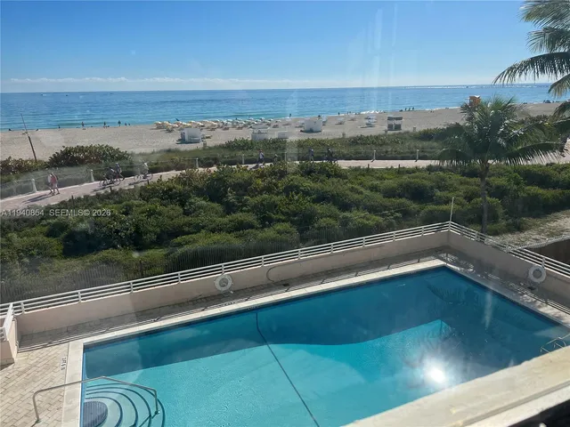 a view of a city with an ocean view