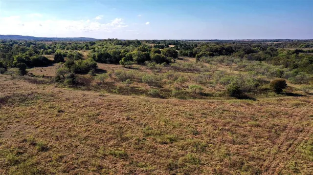 a view of a yard with an outdoor space