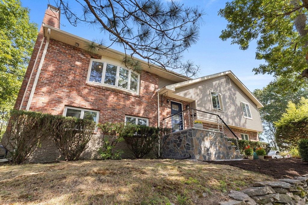 30 Granite Street Dedham, MA 02026 - Photo 1 of 36 a view of a house with a yard
