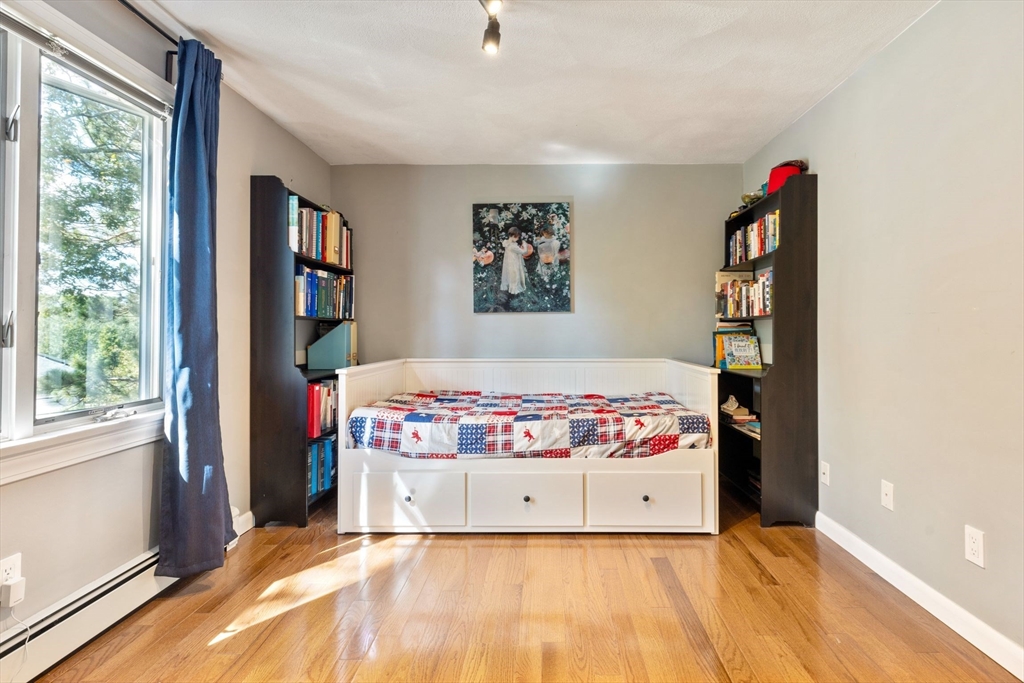 30 Granite Street Dedham, MA 02026 - Photo 14 of 36 a bedroom with a bed and a window